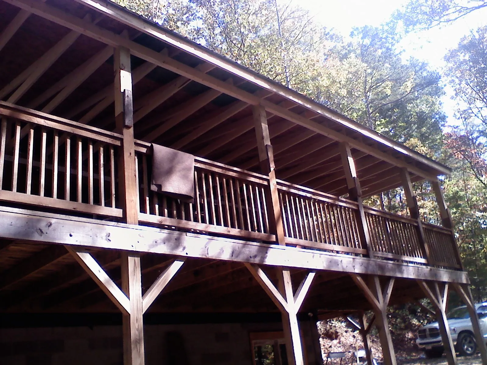 Timber framing under a new elevated porch and deck — Roof Leak Repair in Columbia City by Roofing Brothers